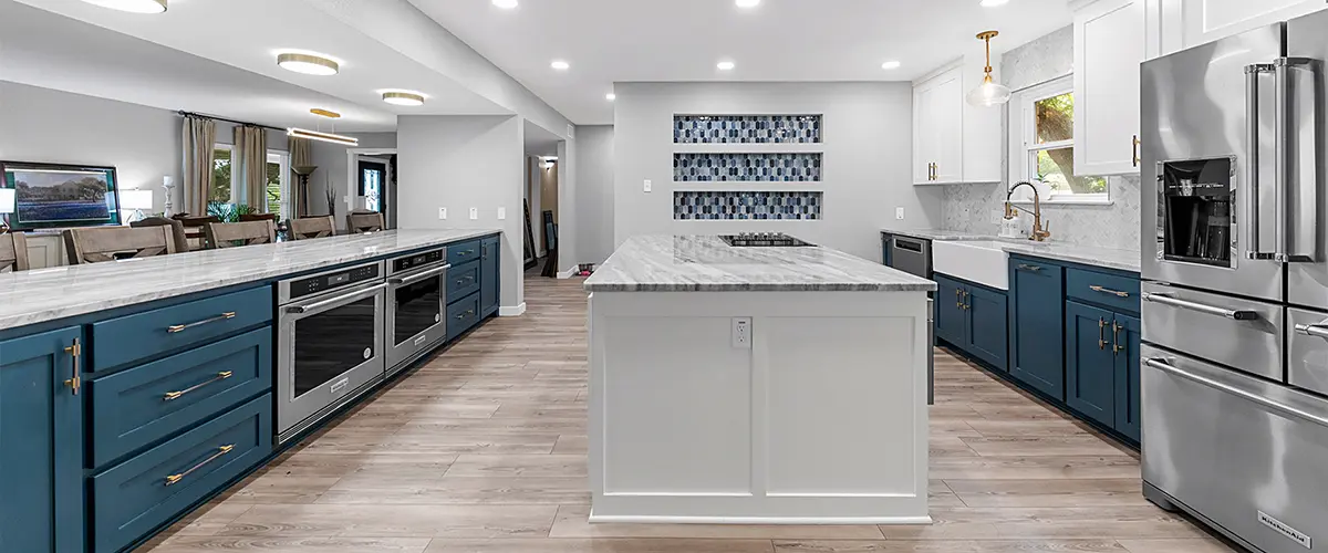 Spacious kitchen remodel with blue cabinets and large island