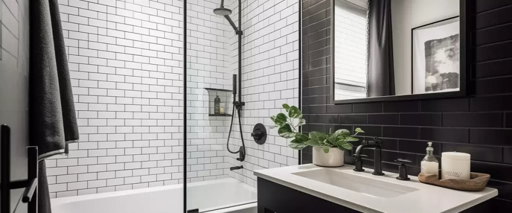 Contemporary black and white bathroom with subway tile shower and sleek vanity design.