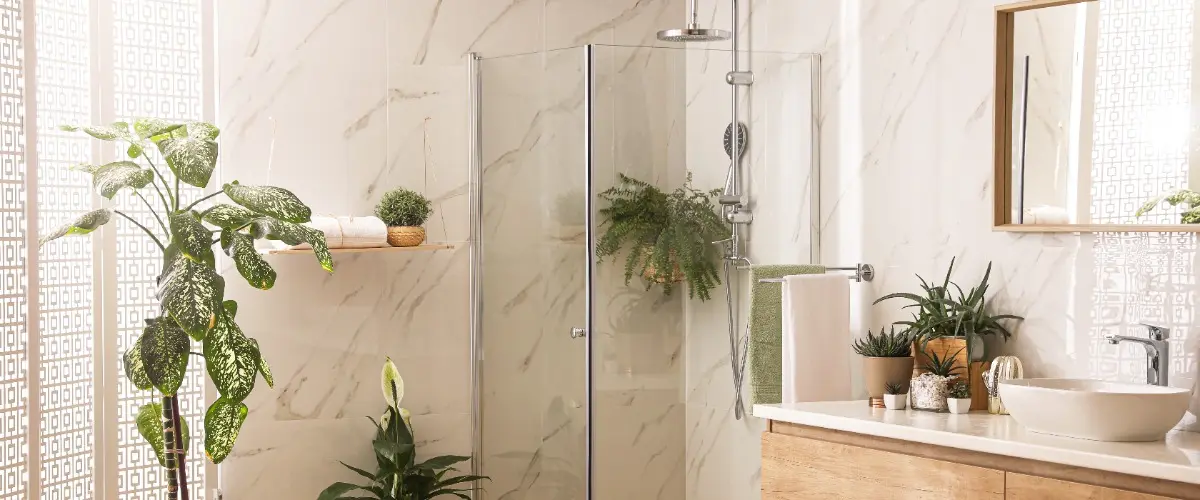 A bathroom featuring a wooden vanity and a modern shower, creating a warm and inviting atmosphere