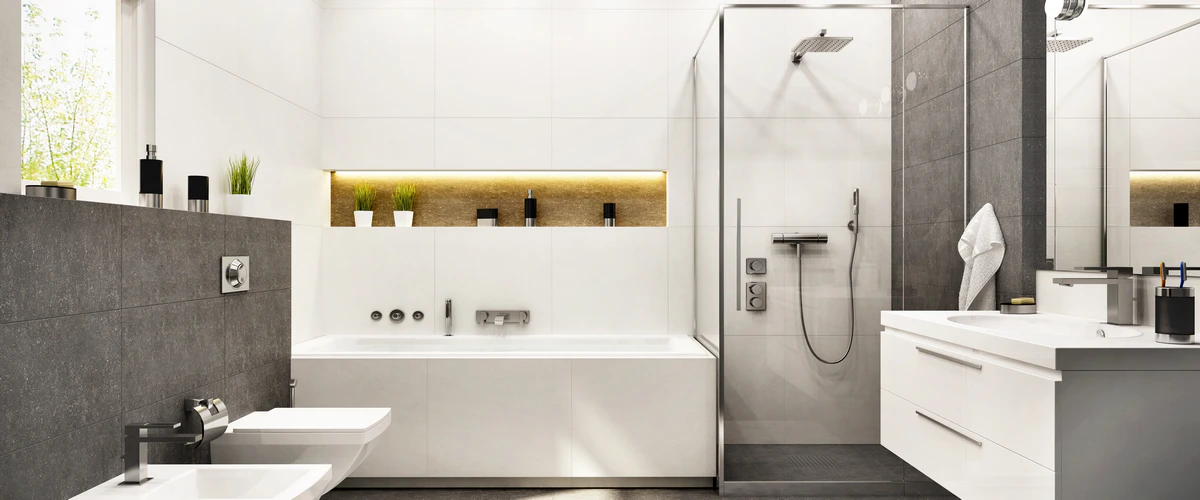 Modern luxury bathroom design featuring a glass-enclosed walk-in shower with a rain showerhead, a white soaking tub, and a recessed lighted wall niche.