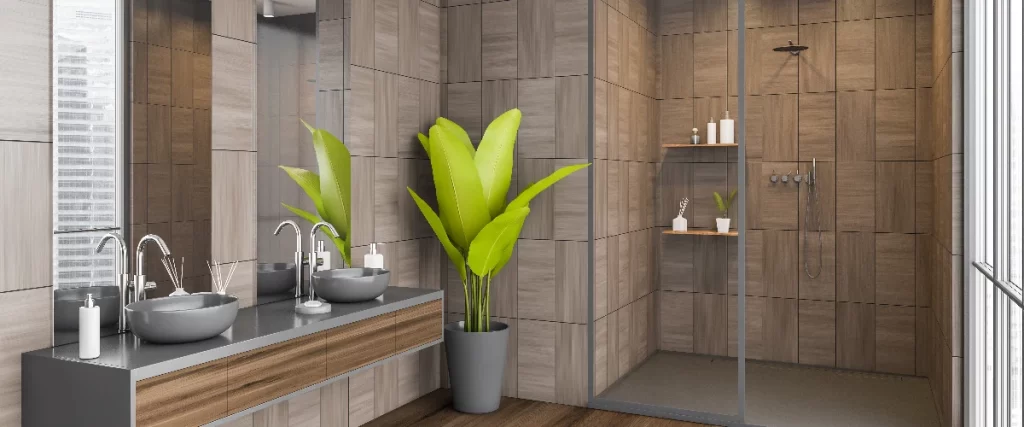 A nature-inspired bathroom design featuring an open shower area with natural wood-look wall tiles, a sleek double vanity, and a vibrant green potted plant.