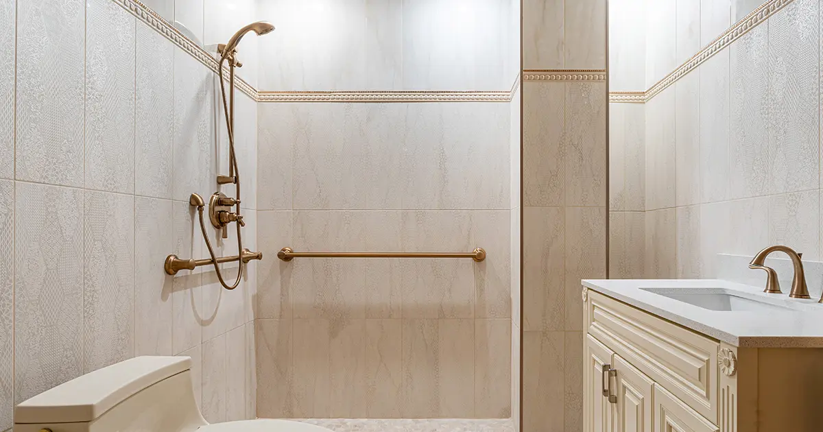 Accessible walk-in shower remodel with grab bars, handheld shower, and custom bathroom vanity