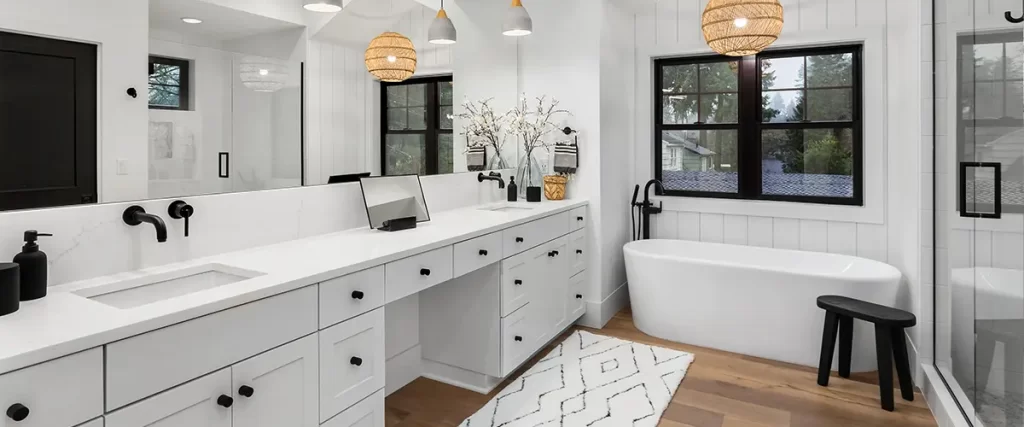 Contemporary bathroom renovation with double vanity, freestanding tub, and glass walk-in shower