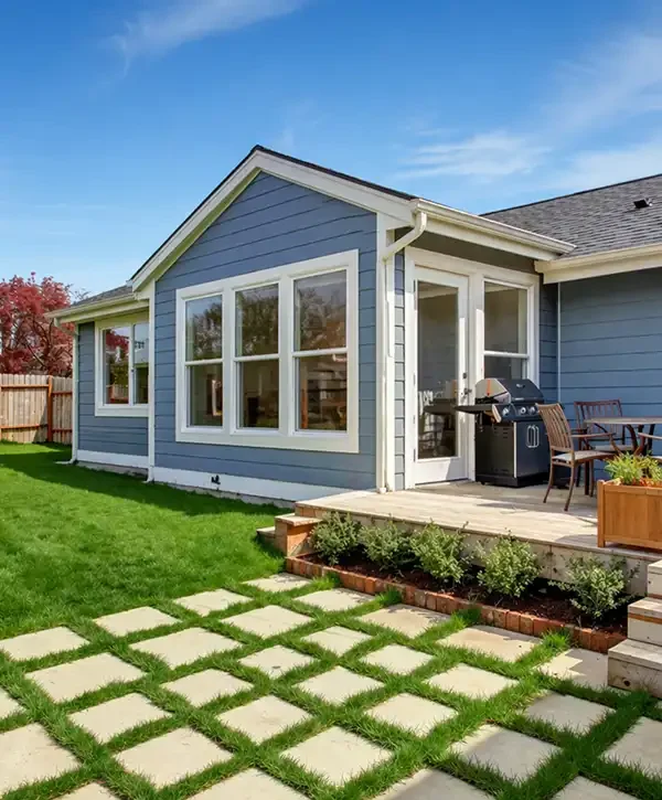 Home addition exterior with expanded living space and natural light