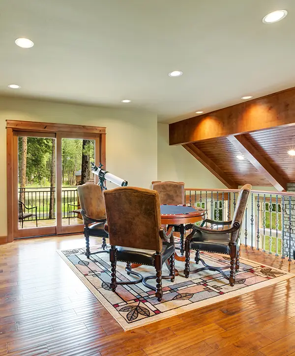 Finished home remodeling interior with warm wood floors and natural light