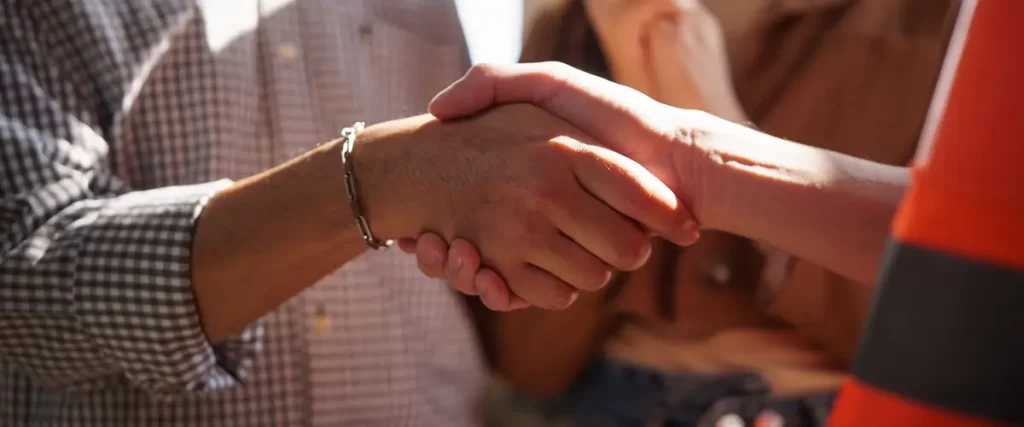 Homeowner and contractor shaking hands after agreeing on a home remodeling project