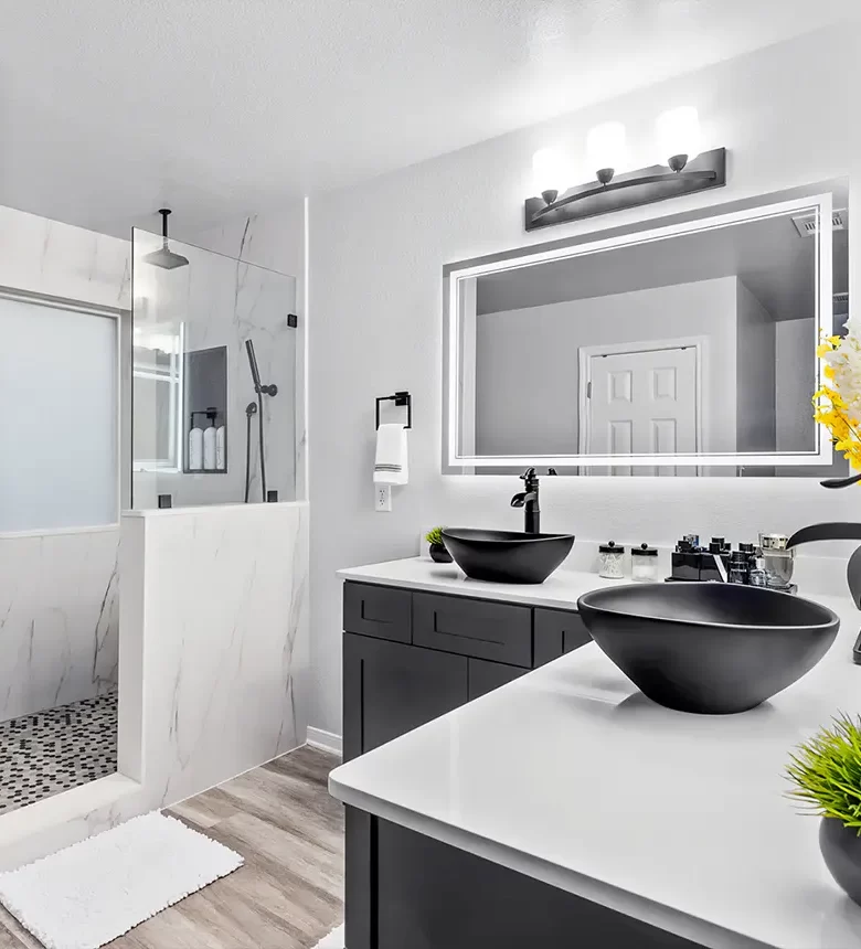 Homepage header - Sleek bathroom remodel with double vessel sinks and walk-in shower